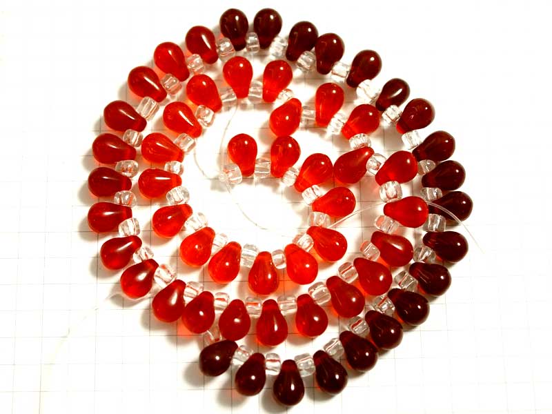 BG169FM グラスビーズ　８×６　ファイアオパール・シャムＭＩＸ　１連