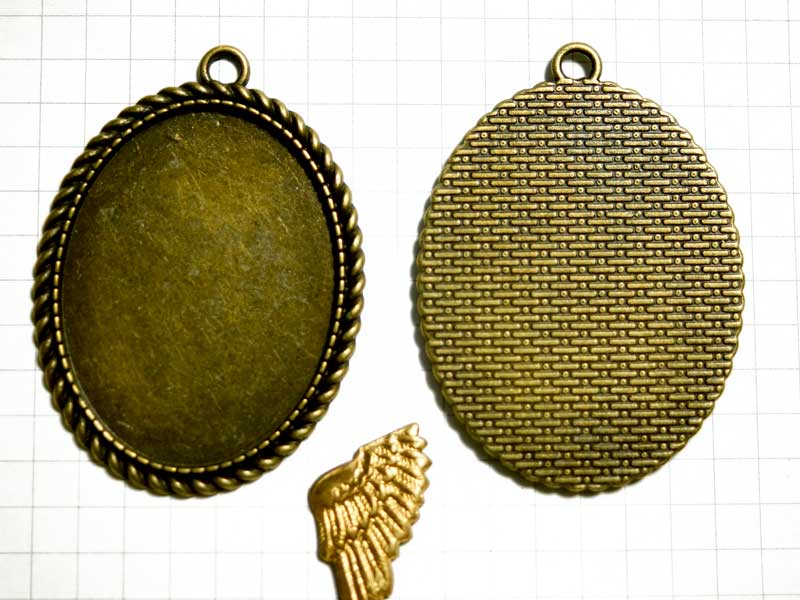 MH022JF　４０×３０　オーバルカボ枠　縄模様　１カン　真鍮古美