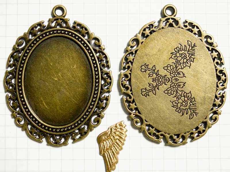 MH031JF　４０×３０　オーバルカボ枠　星飾り　１カン　真鍮古美